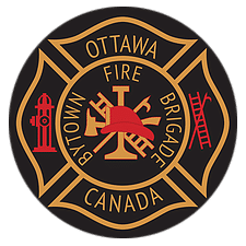 Overlapping firefighting tools including an axe, a ladder, and a helmet are centered in the crest with a red fire hydrant and red ladder to the left and right respectively. Words in logo include Bytown Fire Brigade, Ottawa, Canada. All on a black background with gold lettering.